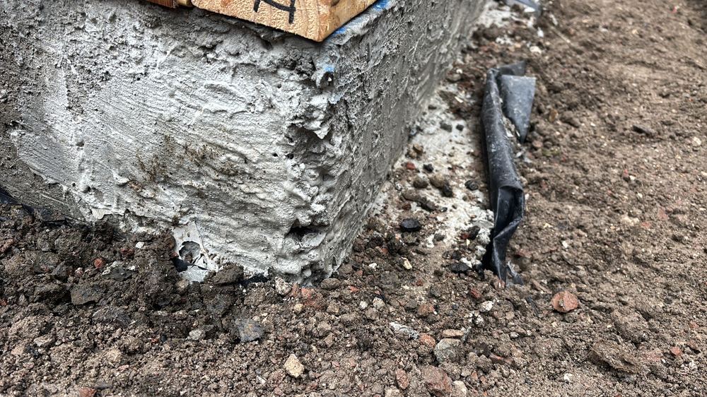 Honeycombing along the slab edge, leaving voids in the concrete that need assessing, found during a frame inspection in Kalkallo
