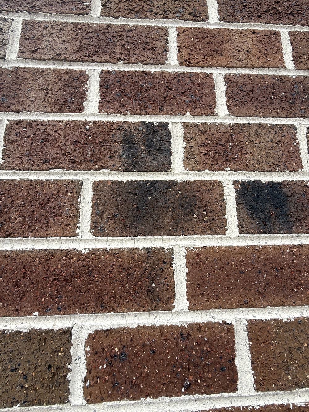 Mortar full of small stones and cracking through the joints, found during a defect investigation inspection in Reservoir