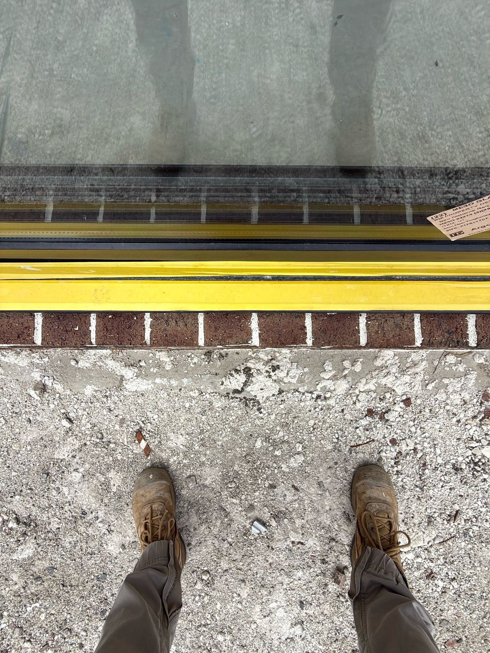 Brick sills laid out of square, so sections stick out from the wall, found during a defect investigation inspection in Reservoir