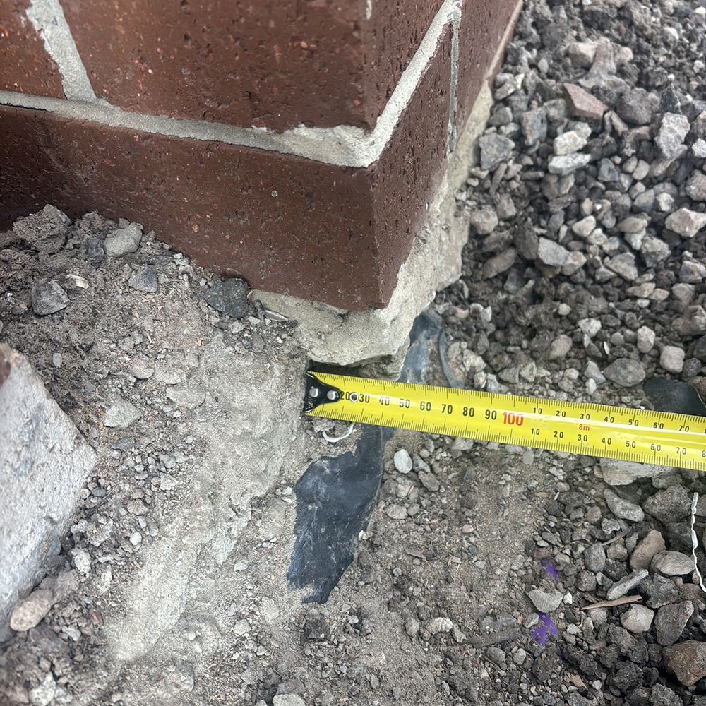 Brickwork overhanging the slab edge by more than 15mm at handover, Kalkallo